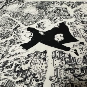 Detalle de la estampación: la figura con capa sobre la ciudad